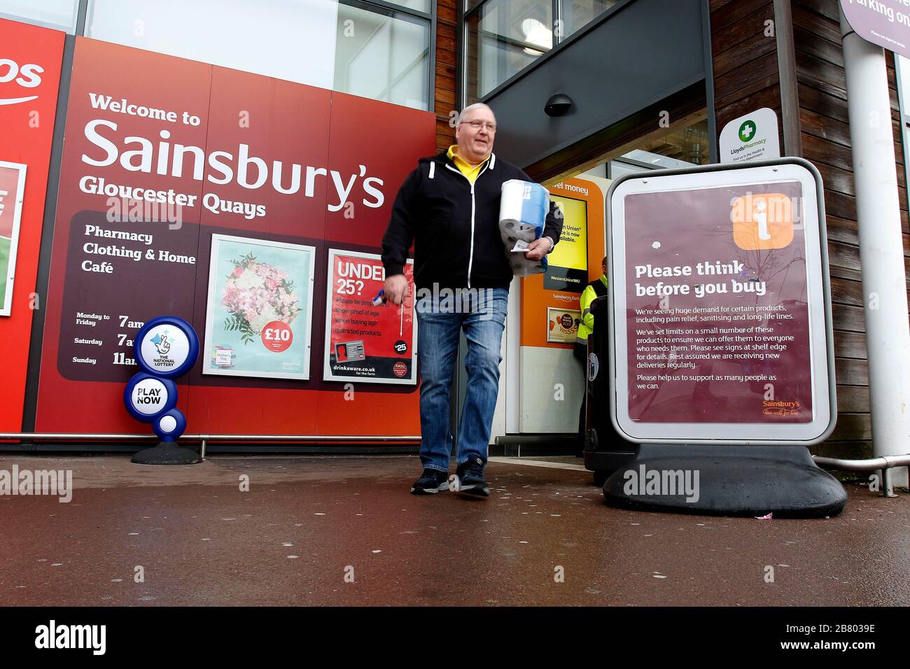 Gloucester, UK. 19 March 2020. Shoppers arriving at Sainsburys Gloucester Quays store for the