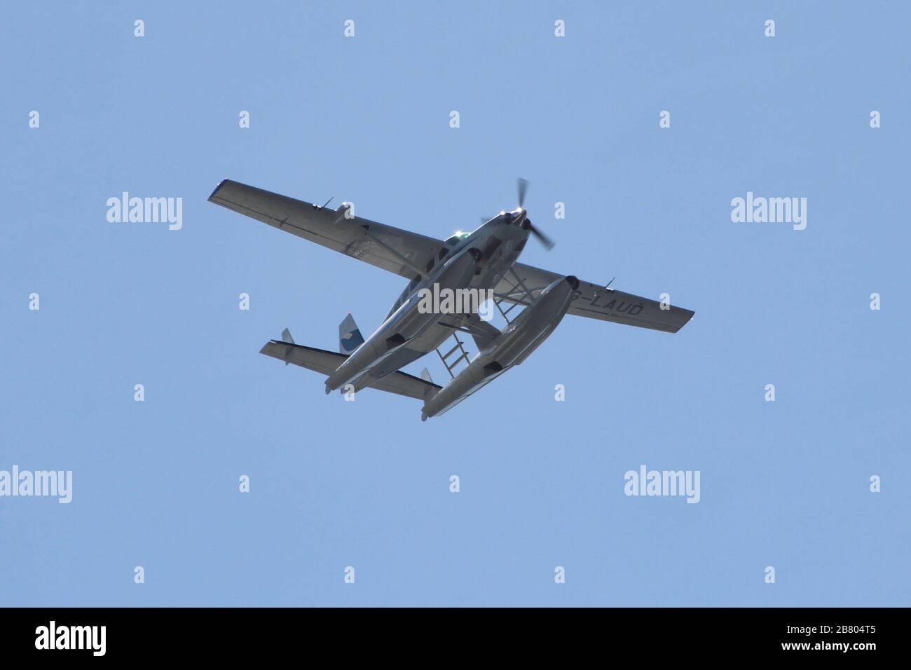 G-LAUD, a Cessna 208 Caravan operated by Loch Lomond Seaplanes, passing over Gourock on the Firth of Clyde. Stock Photo