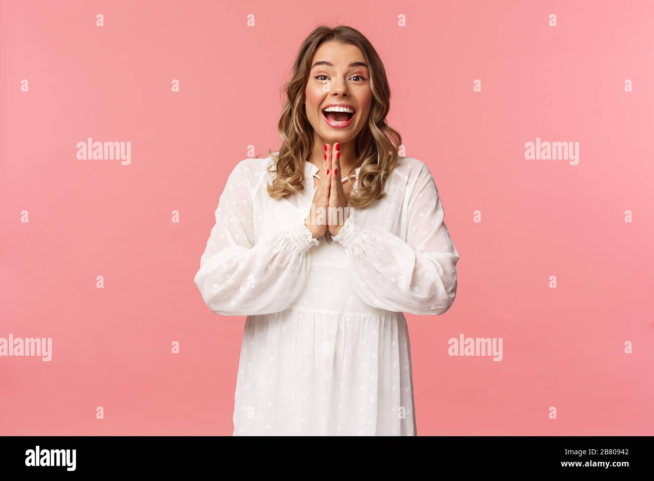 Enthusiastic and excited, happy emotive blond girl applause, clasping ...