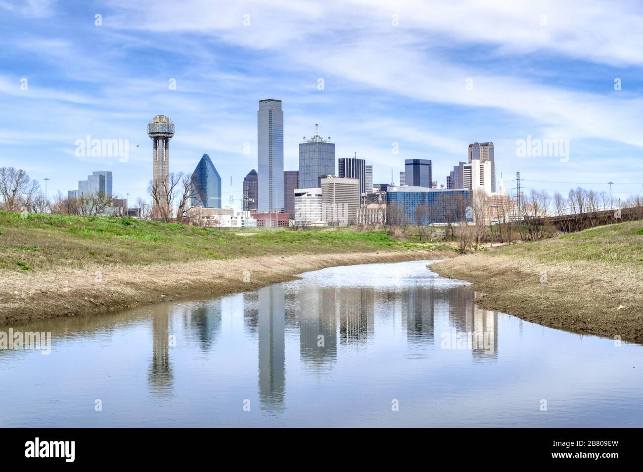 Skyline of Downtown Dallas and Reflection in Stream - Dallas, Texas, USA Stock Photo