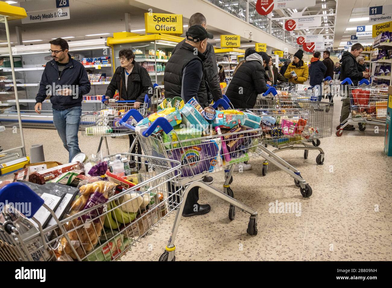 London, UK. 19th Mar, 2020. Panic shopping first thing this morning in a Tesco superstore in South London, UK . People get prepared as London may face a coronavirus lockdown similar to those seen in other European cities. Credit: Jeff Gilbert/Alamy Live News Stock Photo