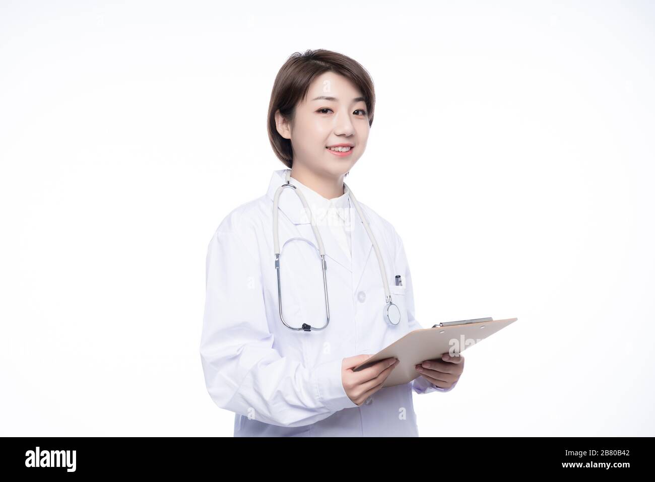 A young Asian woman doctor Stock Photo - Alamy