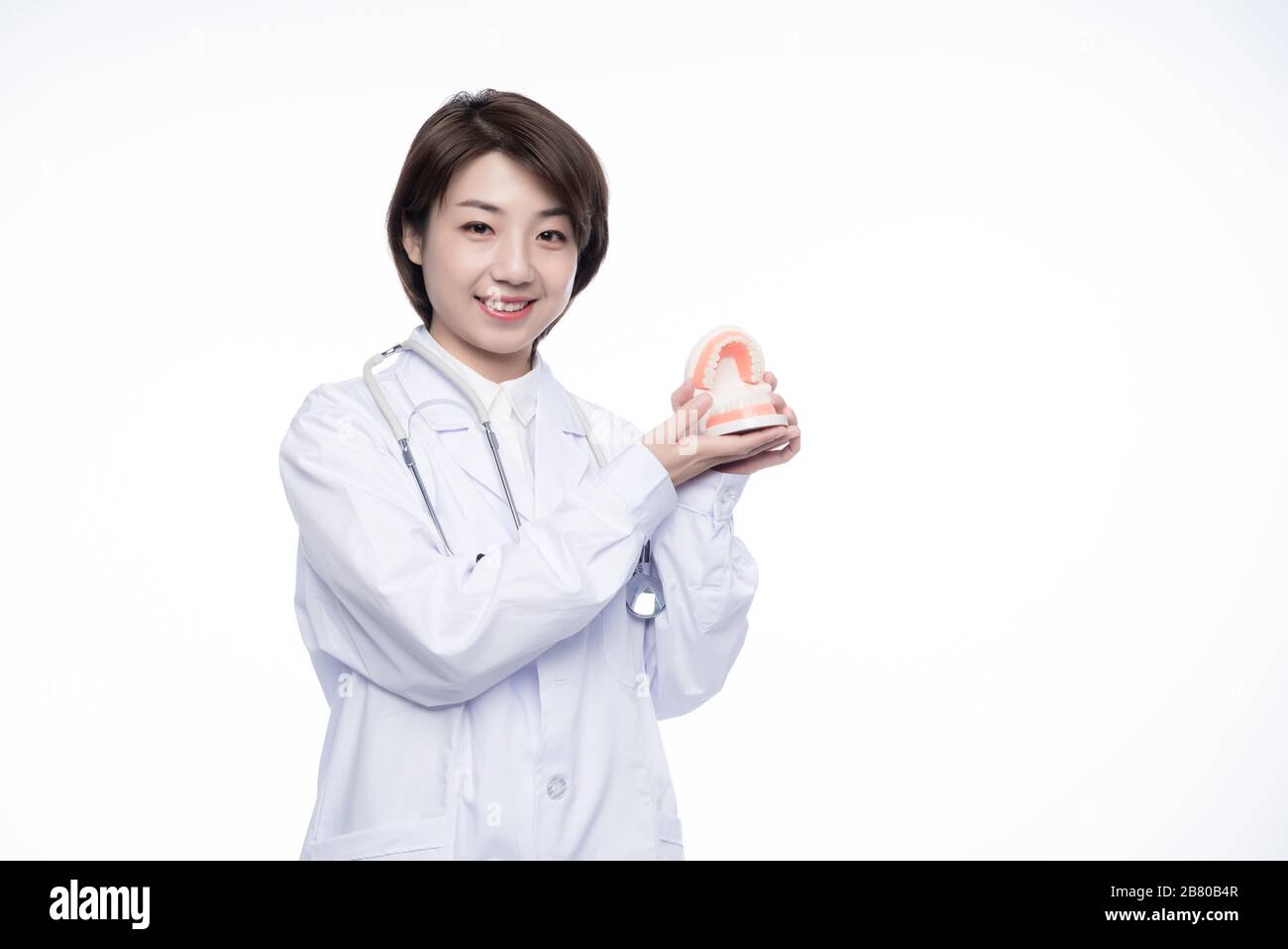 A young Asian woman doctor Stock Photo - Alamy