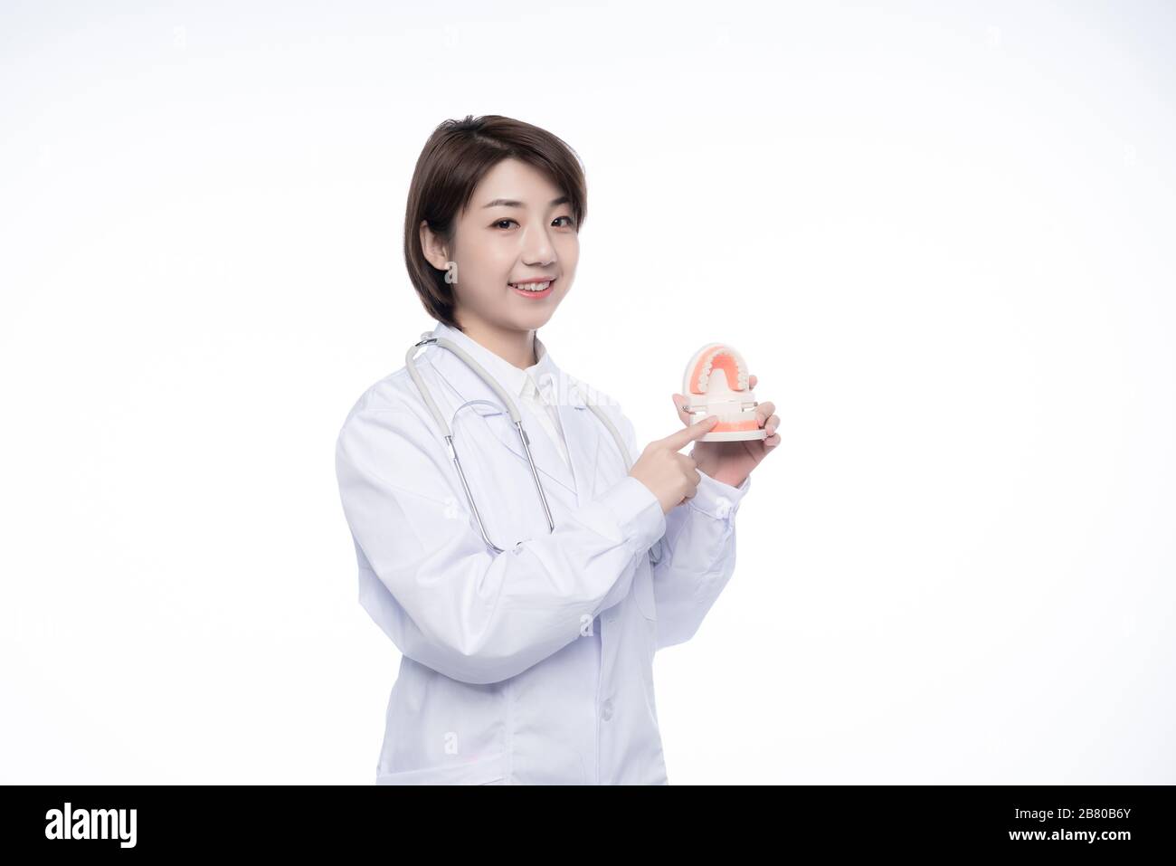 A young Asian woman doctor Stock Photo - Alamy
