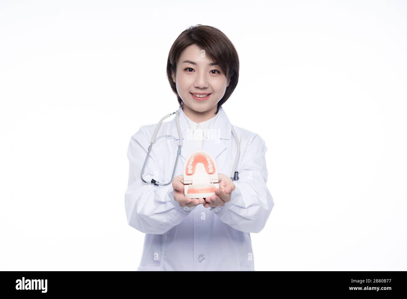 A young Asian woman doctor Stock Photo - Alamy