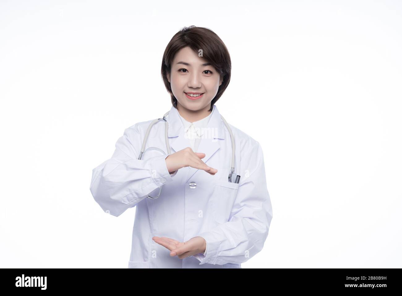 A young Asian woman doctor Stock Photo - Alamy