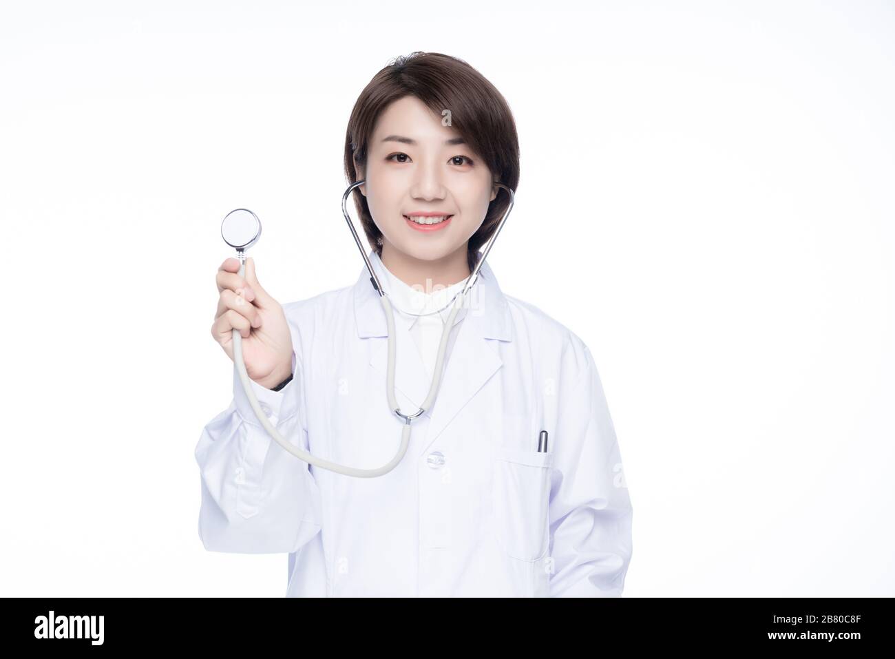 A young Asian woman doctor Stock Photo - Alamy