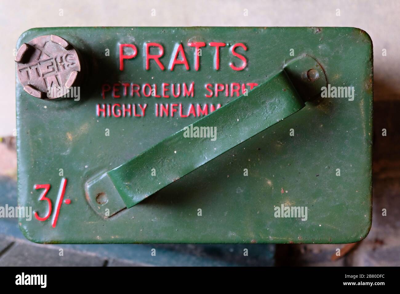 Close up of the top of a Pratt's Vintage Petrol Can marked highly inflammable Stock Photo