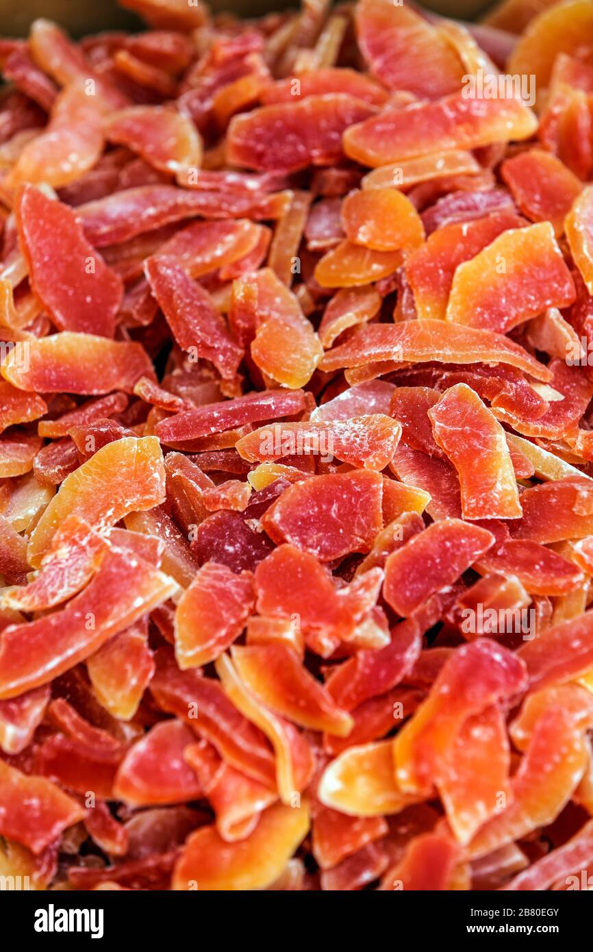 Yellow and orange dried papaya slices background Stock Photo Alamy