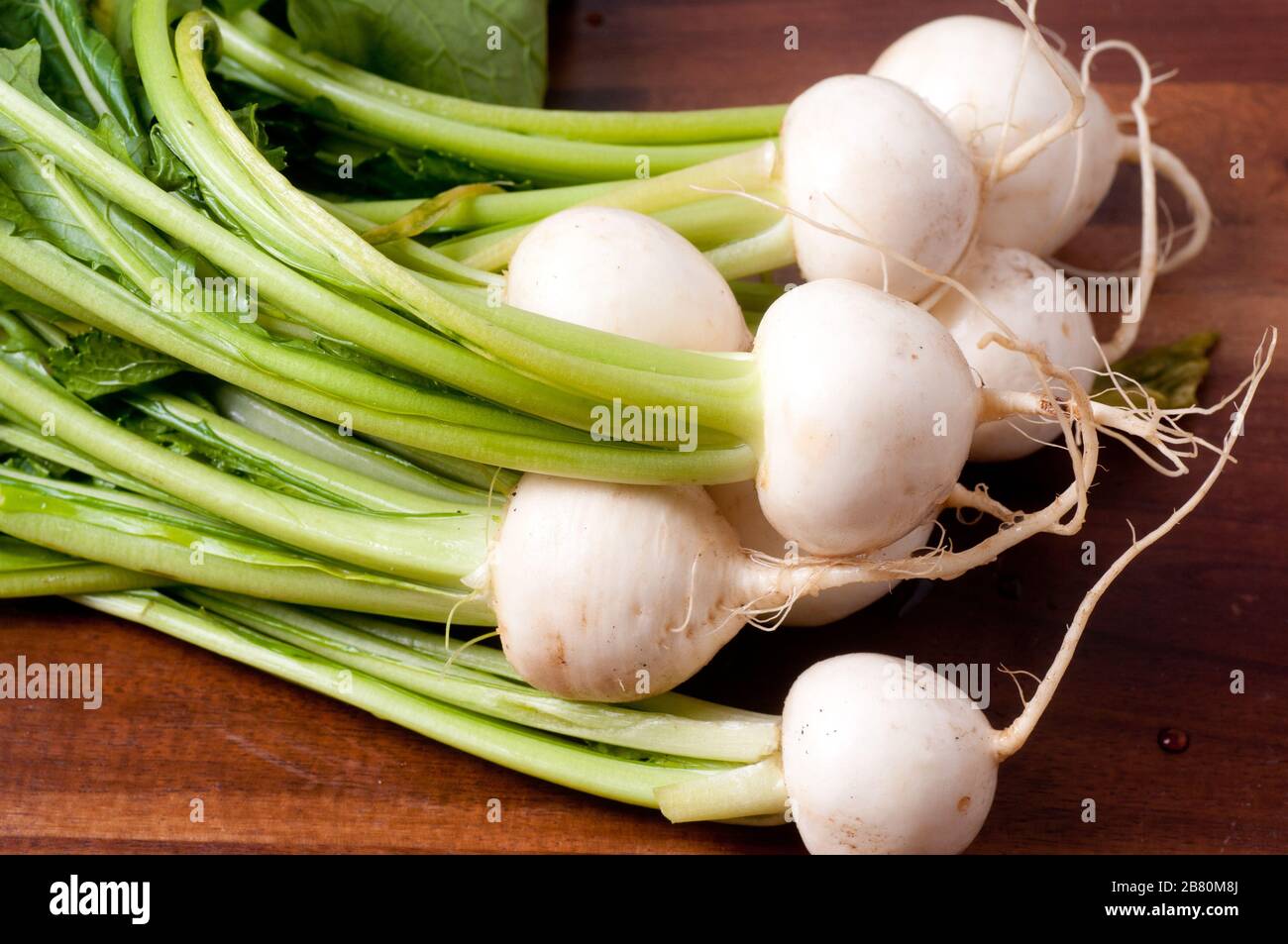 Closeup shot of white turnips on the table Stock Photo