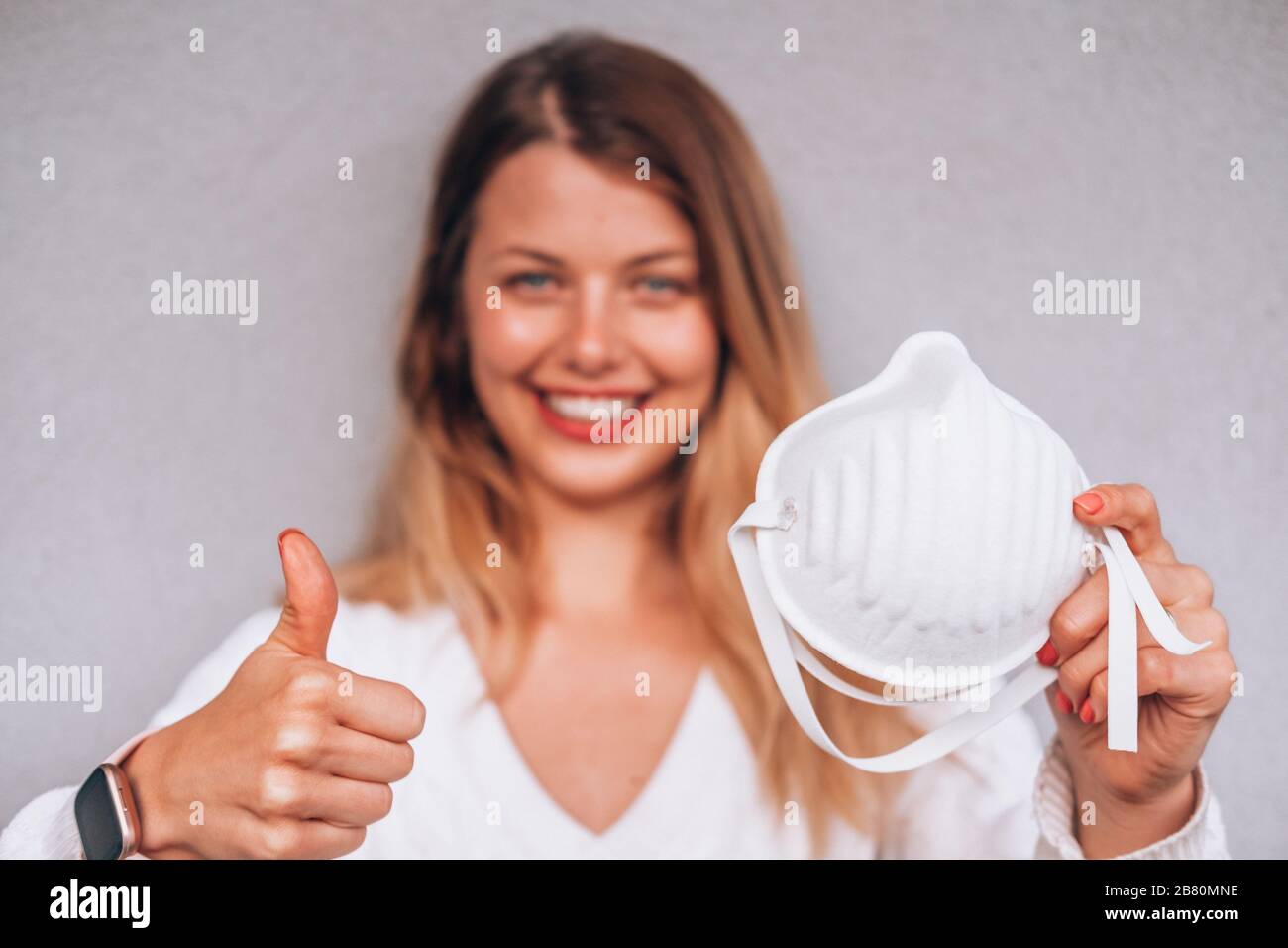 young woman wearing a face mask FFP3 Stock Photo