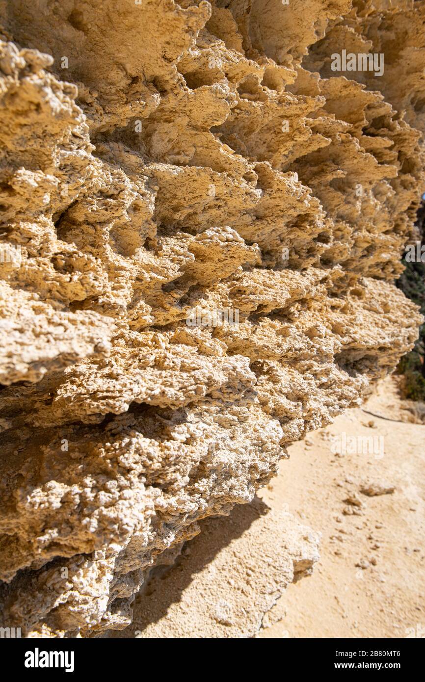 Rock background. Cliff. Maltese limestone  background.  yellow stone ; nature texture and pattern Stock Photo