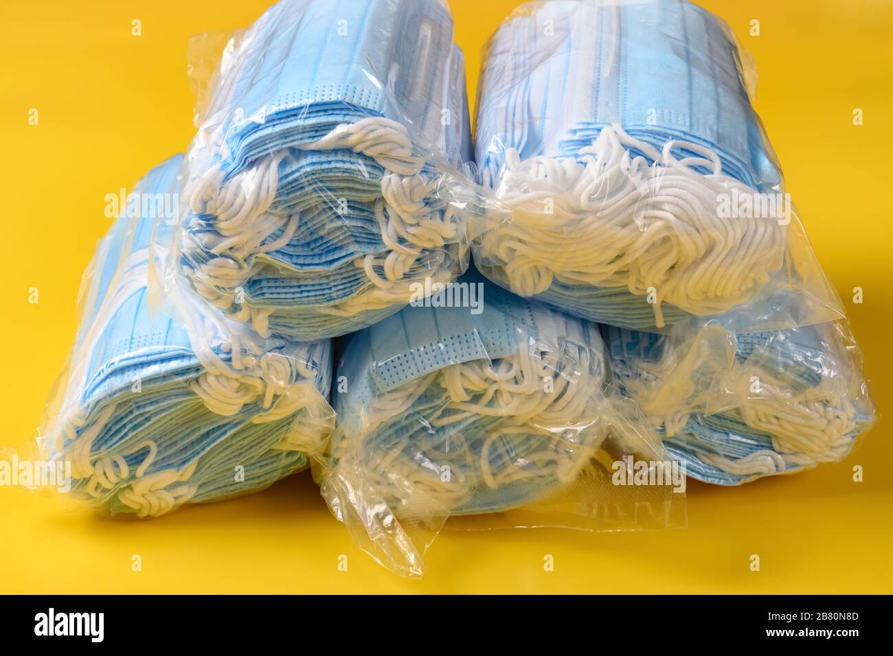 Download Side View 5 Packs Of Medical Face Masks On A Yellow Background Stock Photo Alamy PSD Mockup Templates