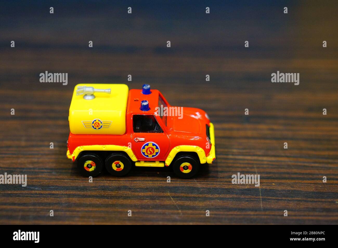POZNAN, POLAND - Mar 13, 2020: Small Fireman Sam Venus toy model vehicle on  a wooden surface Stock Photo - Alamy