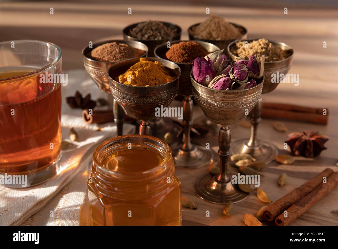 Assortment of different spices in small metal glasses Stock Photo