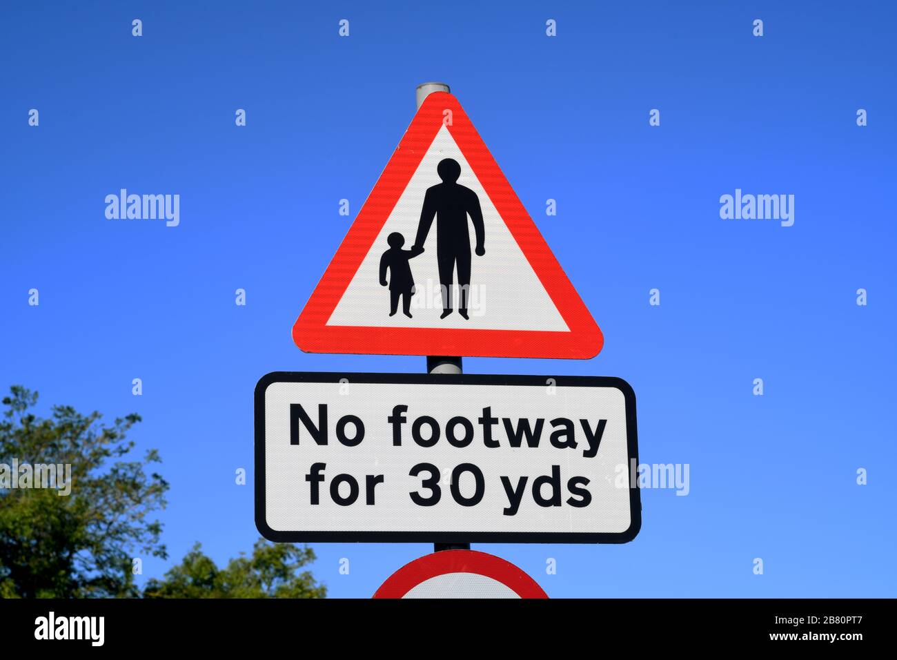 no footway for pedestrians in road ahead warning sign on bridge crossing the river derwent at sutton on derwent united kingdom Stock Photo