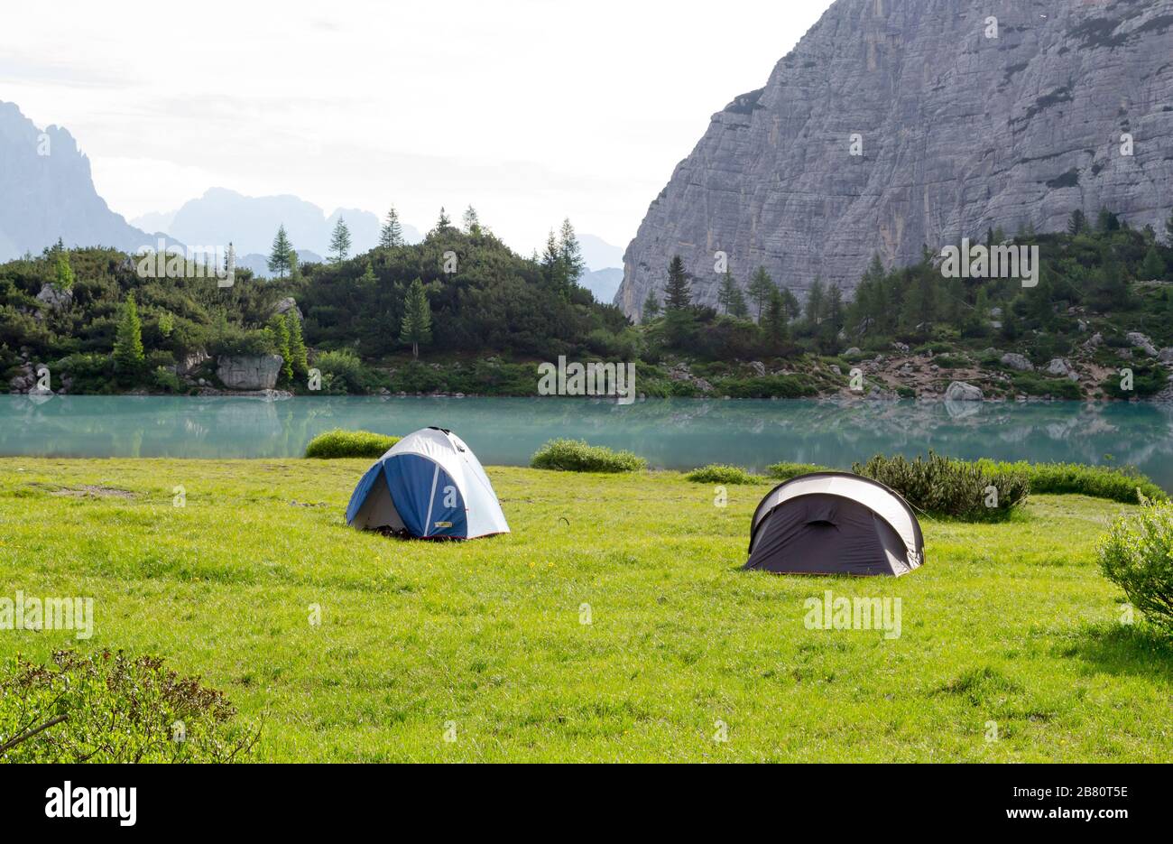 A wonderful place to pitch a tent. The Sorapiss lake in the Dolomites, a  part of the Italian Alps, seems to come out of a fairy tale Stock Photo -  Alamy