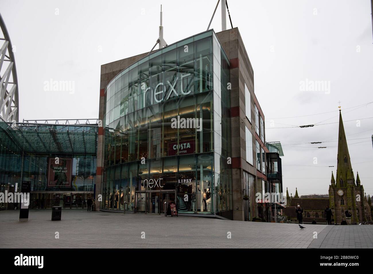 An almost-empty Bullring Shopping Centre in Birmingham, on the day that emergency legislation to tackle the coronavirus outbreak will be published in Parliament after Prime Minister Boris Johnson announced the closure of schools and cancellation of exams. Stock Photo