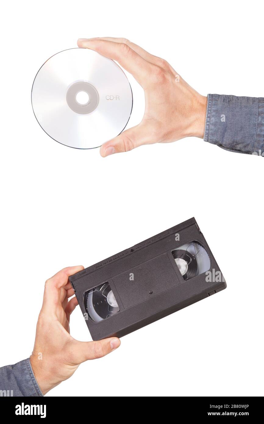 Videotape and cd drive in your hand. On a white background. Stock Photo