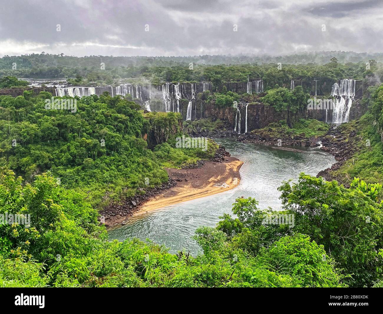 Iguassu Falls National Park; overview, many falls, river, vegetation, heavy clouds, nature, Iguazu; Brazil; Iguacu; South America; summer Stock Photo