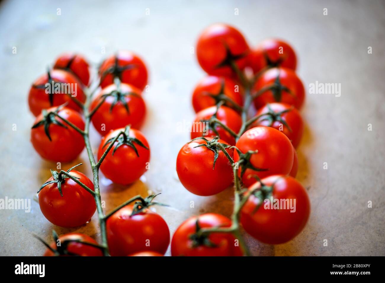 A bunch of cherry tomatoes Stock Photo - Alamy
