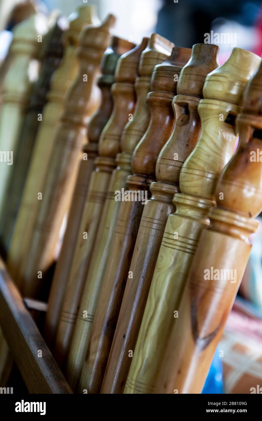 Flutes or dulzainas carved by hand in different types of wood. Lion. Spain Stock Photo