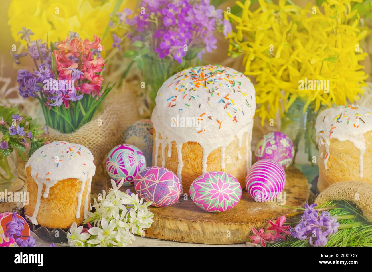 Cake with sprinkles and easter eggs. Easter cake by festive attributes Stock Photo
