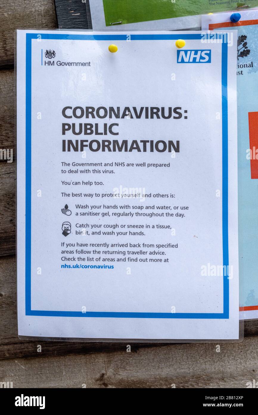 Coronavirus public information notice about Covid-19 at an outside café, UK, giving government and NHS advice on safety precautions Stock Photo