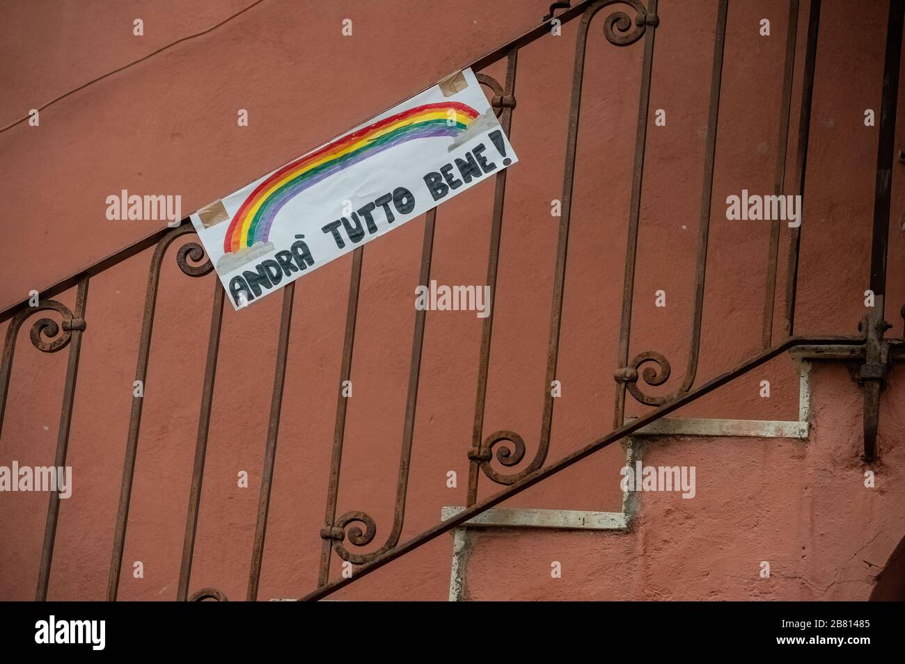 Solidarity banners have appeared on many windows and balconies of houses in the popular Garbatella district in Rome, Italy, in the fight against the Coronavirus epidemic that has hit the country heavily. The phrase most often cited in these banners is 'Tutto andrà bene - Everything will be fine'. Stock Photo