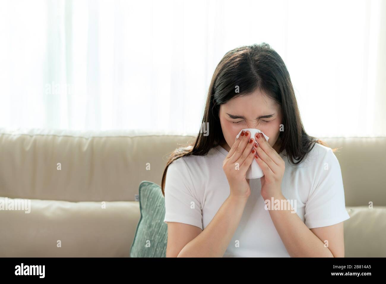 Young woman blowing dust hires stock photography and images Alamy
