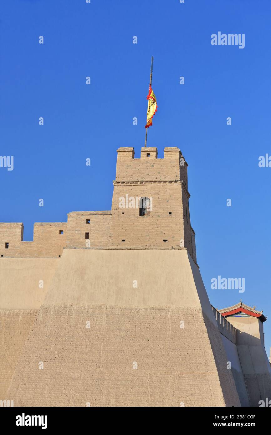 Flag on turret-NE.corner of outer wall-Jiayu Pass fortress. Jiayuguan-Gansu-China-0730 Stock Photo