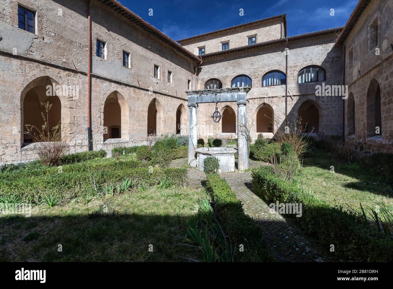 Subiaco, Italy - February 23, 2020: Monastery of Santa Scolastica - the ancient well from inside the cloister. Stock Photo