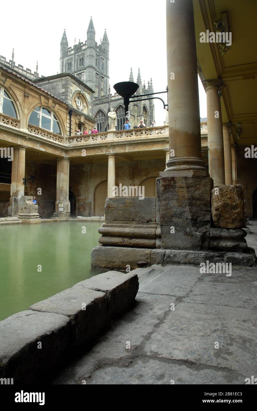 Great Bath, this centrepiece of the Roman baths is a pool, lined with 45 sheets of lead, and filled with hot spa water. It once stood in an enormous b Stock Photo