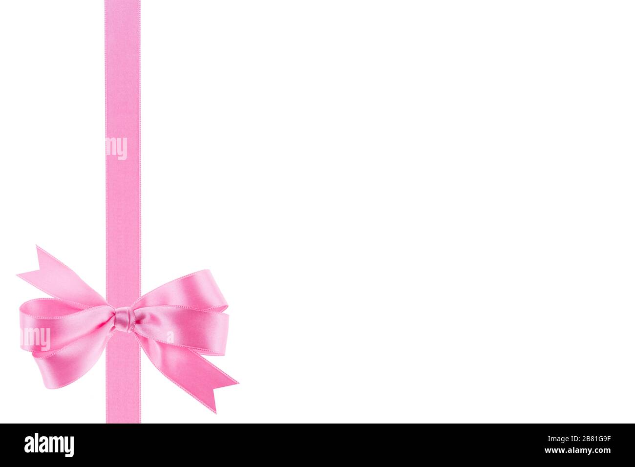 Pink ribbon with a bow on white background Stock Photo - Alamy