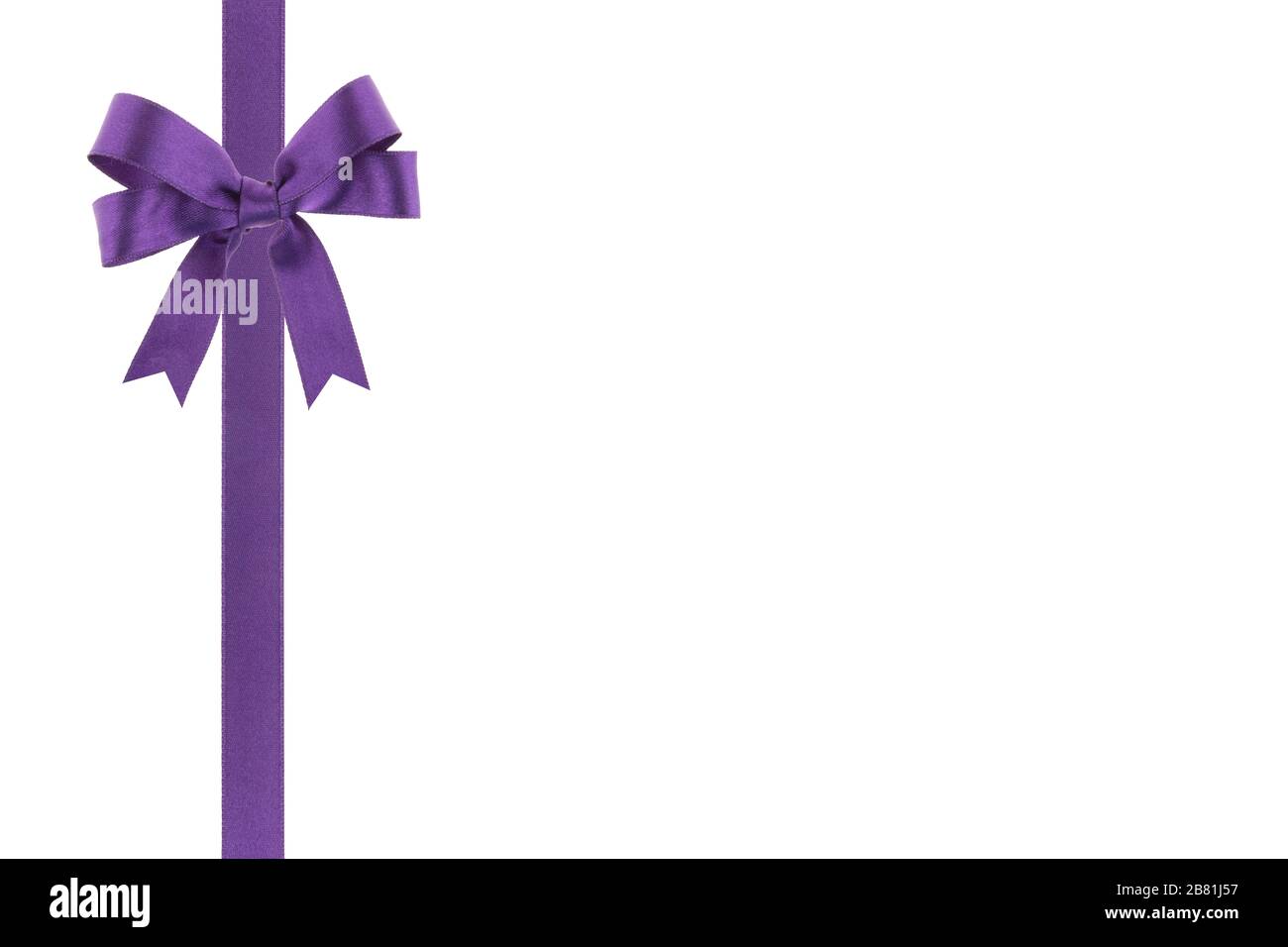 Purple ribbon with a bow on white background Stock Photo - Alamy