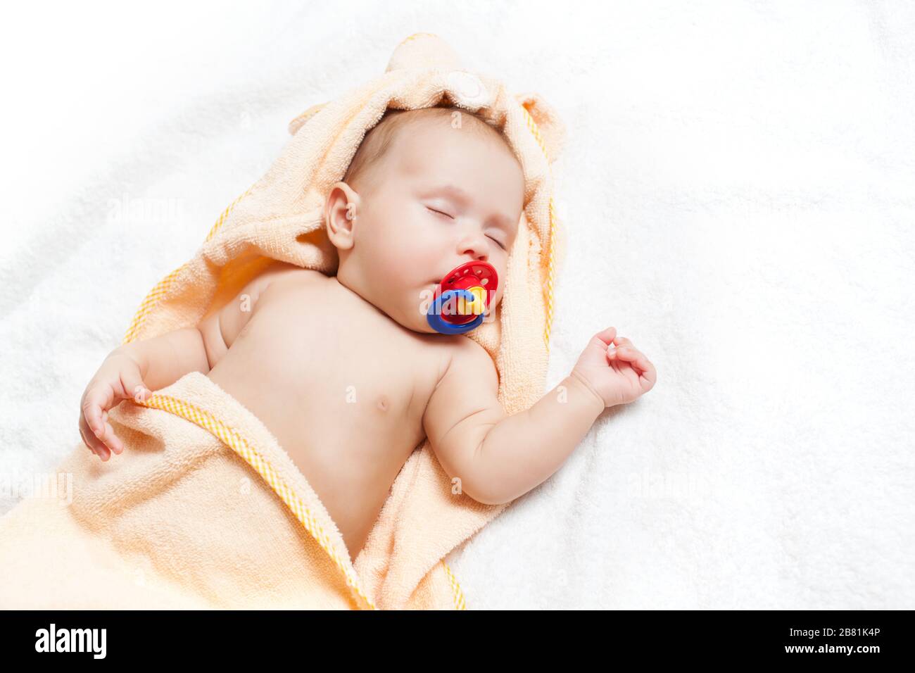 Baby soother wrapped in blanket hires stock photography and images Alamy