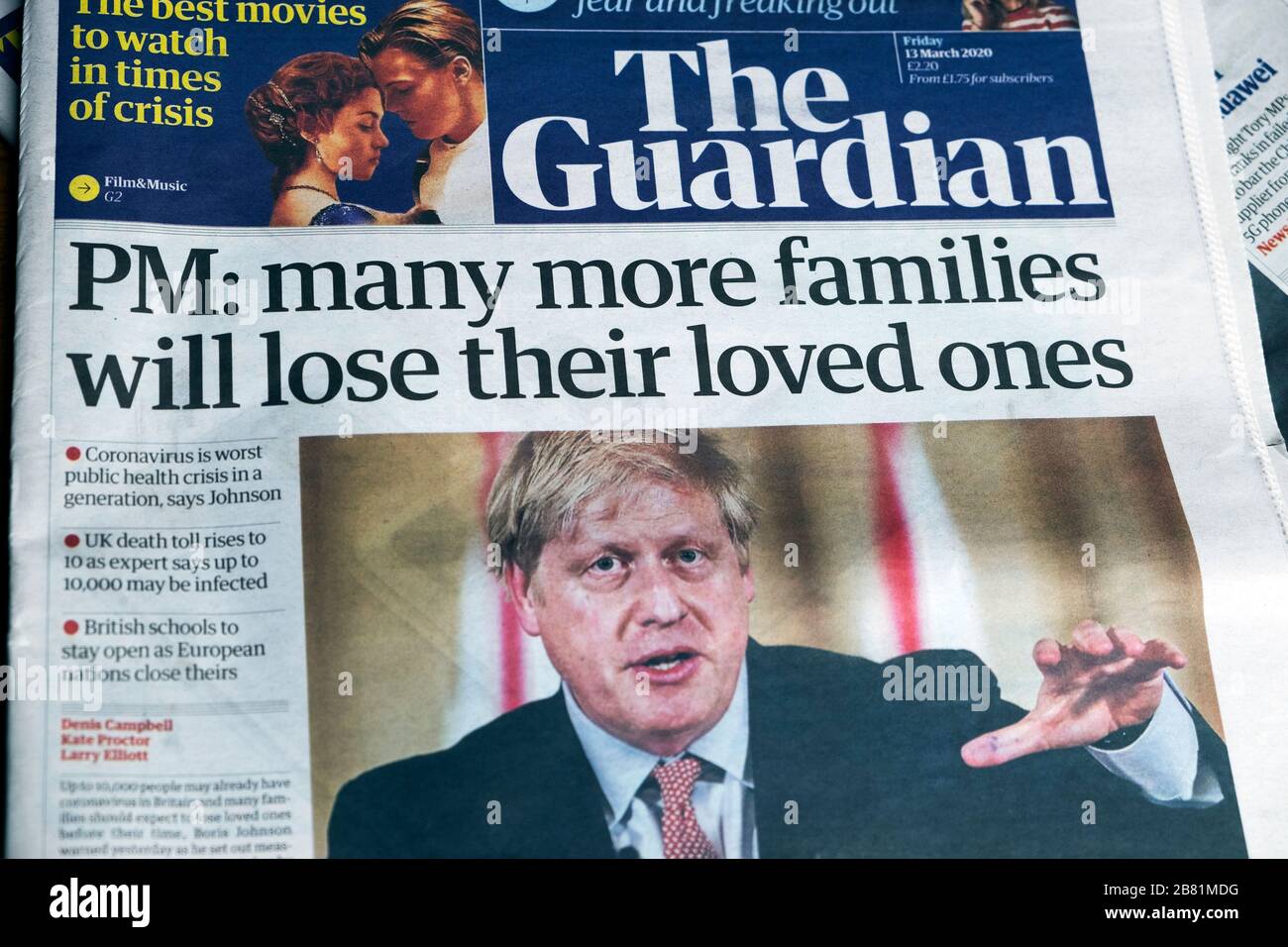 Boris Johnson 'PM: many more families will lose their loved ones' The Guardian front page newspaper headline 13 March 2020 London England UK Stock Photo
