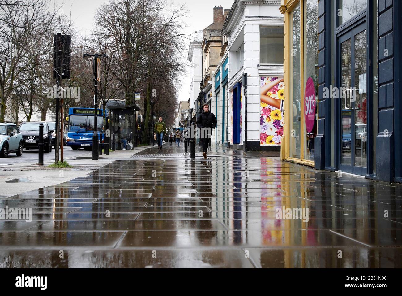 Cheltenham, UK. 19 March 2020. UK Coronavirus, Covid-19, Promenade, Cheltenham, England, usually a busy shopping area, almost empty due to social distancing and self-isolation requested by the UK Government during the coronavirus pandemic. Credit: Andrew Higgins/Thousand Word Media Ltd/Alamy Live News Stock Photo