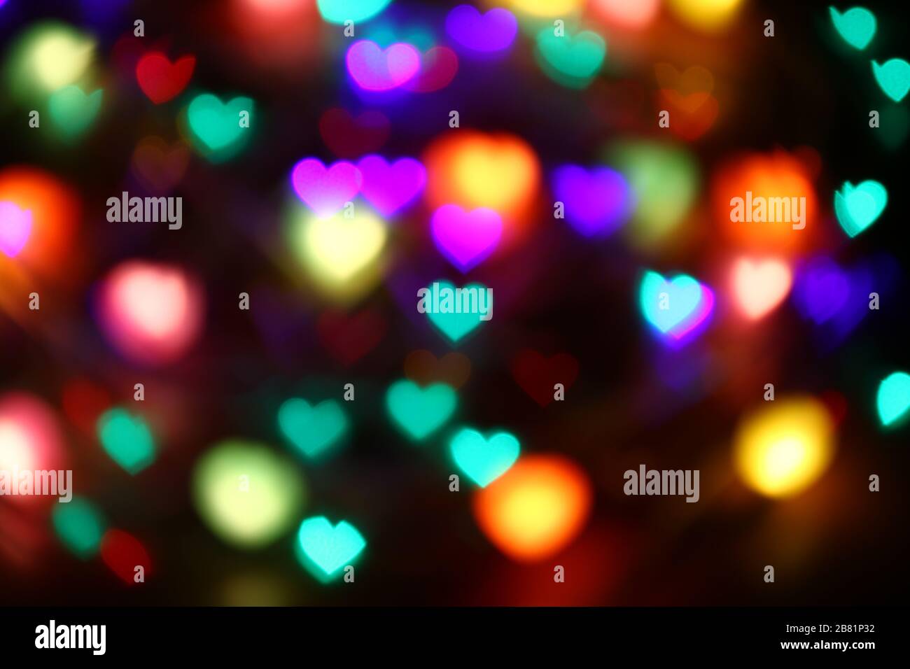 Valentines Colorful heart-shaped bokeh on black background lighting bokeh  for decoration at night backdrop wallpaper blur valentine, Love Pictures  bac Stock Photo - Alamy