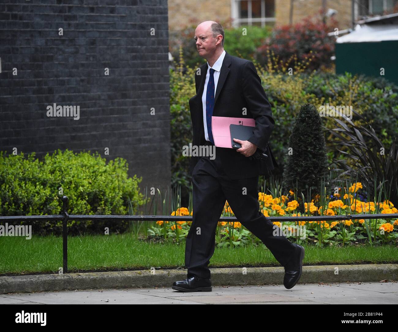 Chief Medical Officer for England Chris Whitty arrives back at 10 Downing Street, London, as the government is expected to publish an emergency coronavirus powers Bill. Stock Photo