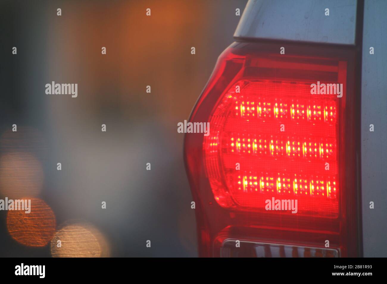 Warning light side back car evening, Brake lights of car back, Warning