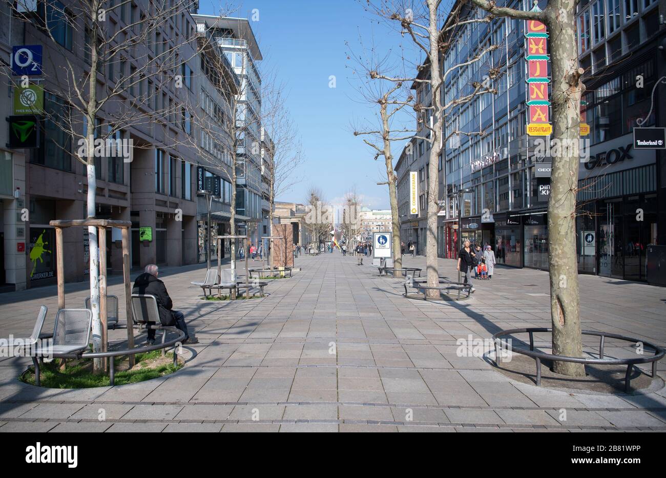 Stuttgart, Germany. 19th Mar, 2020. Only a few people can be seen on the  shopping mile Königstraße in the early afternoon of a working day. Numerous  shops in downtown Stuttgart are closed