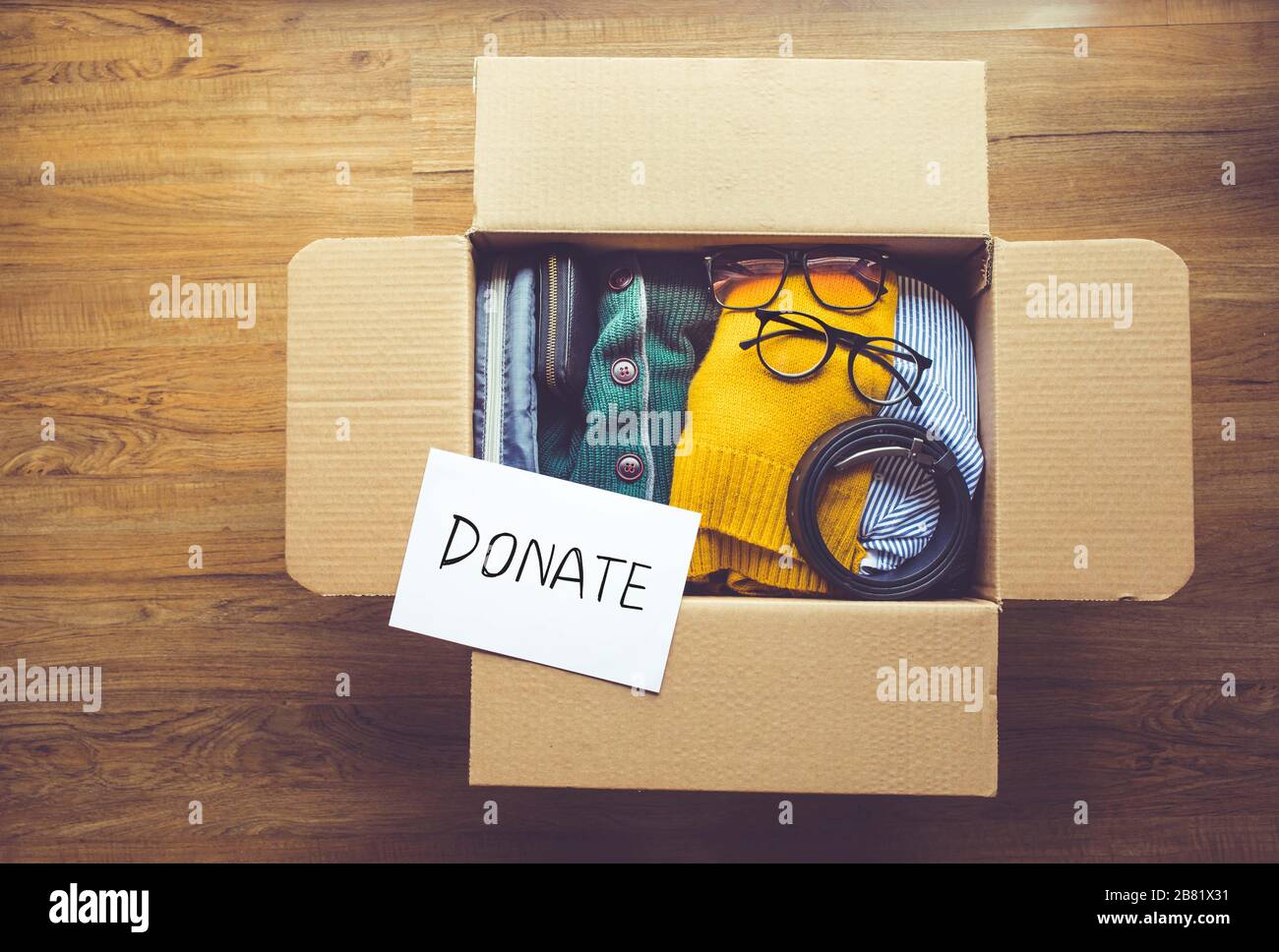 Donation concepts with accessories clothing in packing box.giving and ...