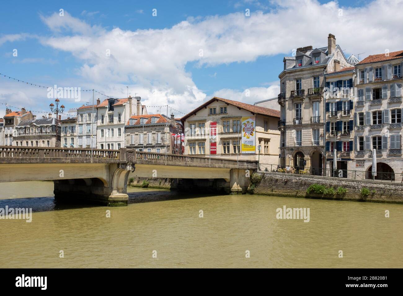 The Pont Marengo (Marengo Bridge) stretching over the Nive River to the Petit Bayonne quarter in Bayonne, the capital of the French Basque country Stock Photo