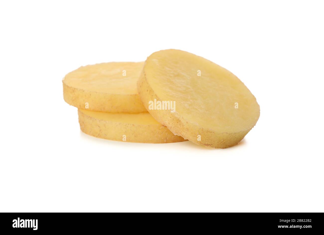 Young potato slices isolated on white background Stock Photo