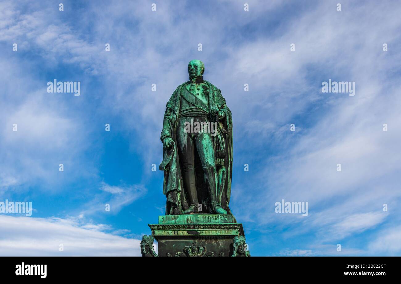 Detail view on Monument of Karl Friedrich von Baden with blue sky in background. Near Castle Karlsruhe, Baden-Wurttemberg, Germany Stock Photo