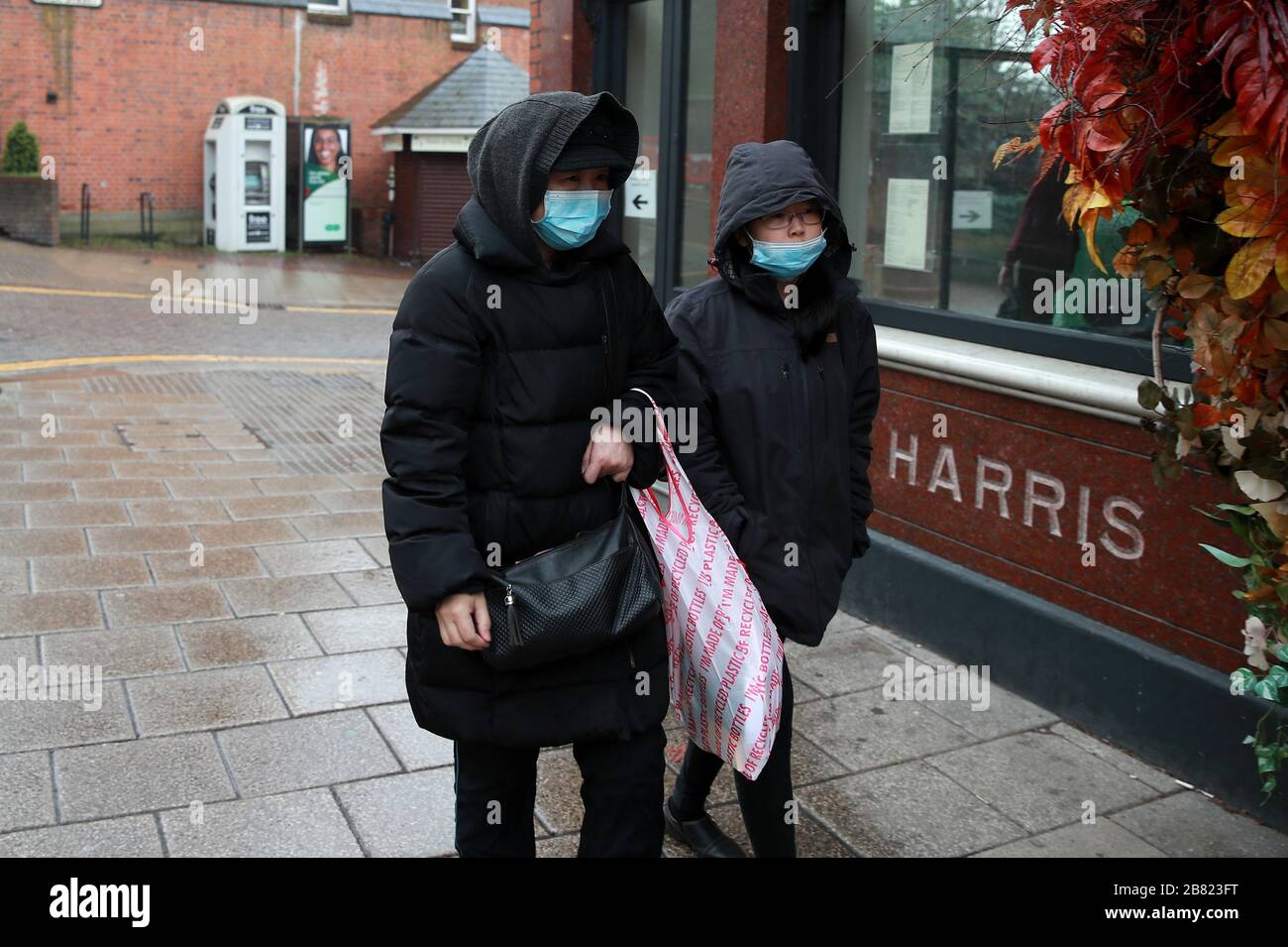 People wearing facemasks in Windsor. Stock Photo