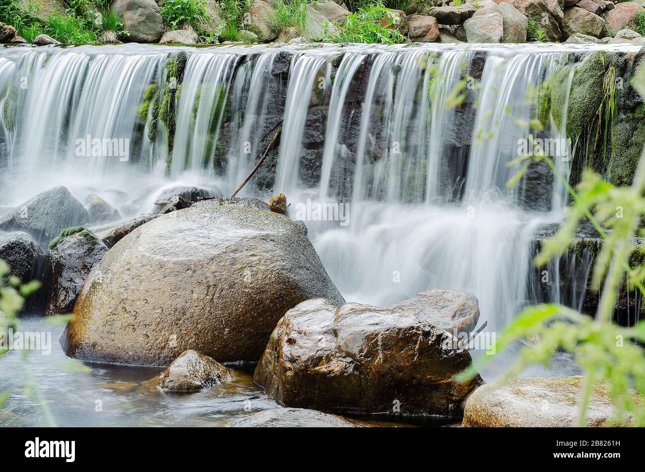 waterfall on a mountain river in the forest 4 Stock Photo - Alamy