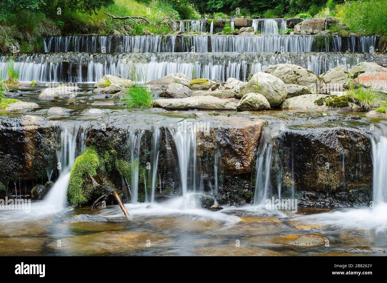 waterfall on a mountain river in the forest 9 Stock Photo - Alamy