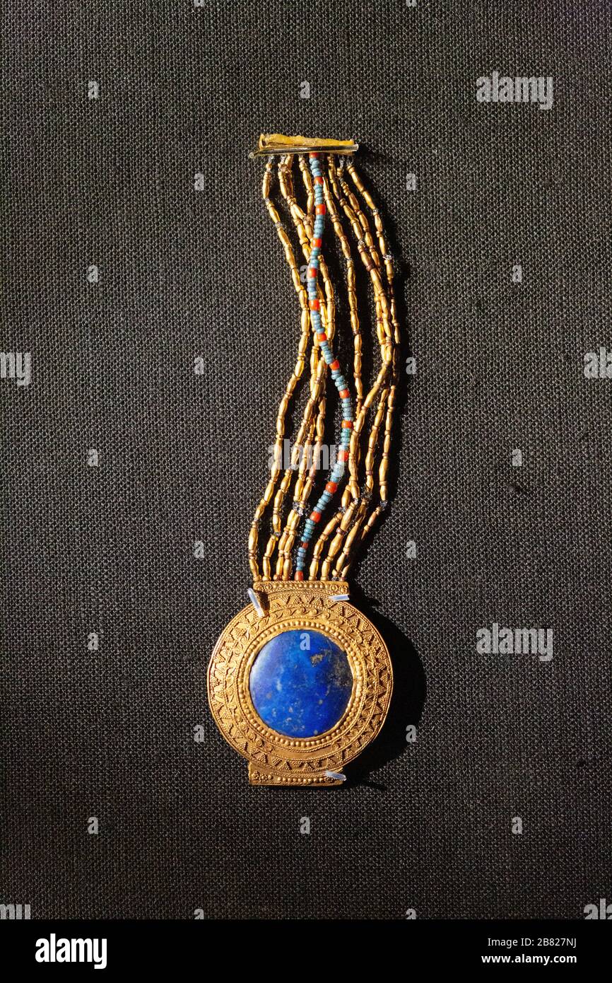 Ancient egyptian jewelery; A gold and lapis lazuli bracelet from Tutankhamuns tomb treasures, Ancient Egyptian history Stock Photo